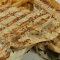 Grilled Sausage Panini · Grilled Italian sausage, minced garlic, fresh spinach, provolone olive oil, and Italian seas...