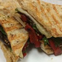 Grilled Milano Panini · Grilled eggplant, roasted red peppers, provolone cheese, creamy pesto mayonnaise, and baby l...