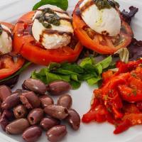 Caprese Salad · Fresh mozzarella, sliced ripe tomatoes, red roasted peppers and Italian olives, balsamic red...