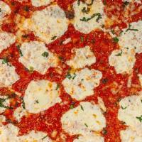 Brooklyn Pizza · Thin crust square pizza with chunks of tomato, fresh mozzarella, and basil.