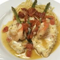 Chicken & Shrimp Princess · Chicken breast sautéed in a white wine garlic sauce with shrimp, asparagus, and fresh sundri...