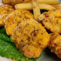 Wings · 10 wings, choice of hot, extra hot, Hot or BBQ. Side of house blue cheese.