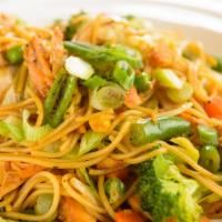Chicken Stir Fried Noodles · Noodles fried with veggies and chicken pieces.