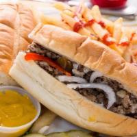 Ribeye Cheesesteak Platter · Made with 1/2 lbs of 100% rib eye beef with fries.