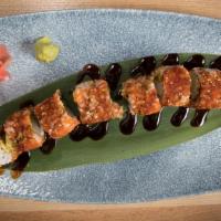 Shrimp Tempura Roll · Fried shrimp, cucumber, tempura flakes, unagi sauce.