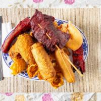 Pu Pu Platter (For 2) · Served with boneless spareribs, teriyaki beef (2), fried shrimp (2), chicken fingers (2), ch...