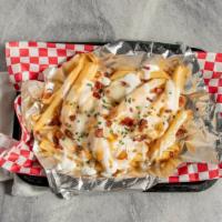 Loaded Fries · Bacon, whiz, provolone and drizzled with ranch dressing.