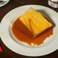 Pudim · Flan made with condensed milk topped with caramel.