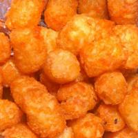 Mini Sweet Potato Tots · Small side of sweet potato tater tots. The best sweet potato tots served with house-made hon...