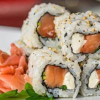 The Philly Maki-Roll · An inside-out roll with smoked salmon, cream cheese, and scallions.