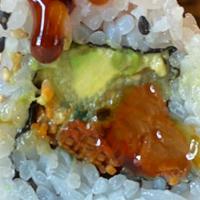 Dragon Roll · Vegan broiled eel, cucumbers, avocado, sesame seeds, nori, or soy paper. Six pieces.
