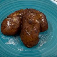 Empanada · Another sweet treat from el salvador! Fried banana paste filled with milk or fried smashed b...