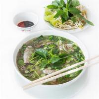 46 Noodle Soup W/ Eye Round Steak, Brisket, Flank, Fatty Flank, Tendon, & Tripe · Pho Dact Biet - All noodle soups are garnished with onions, scallions and cilantro. Served a...