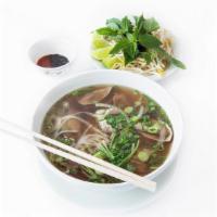30 Noodle Soup W/ Eye Round Steak · Pho Tai - All noodle soups are garnished with onions, scallions and cilantro. Served alongsi...