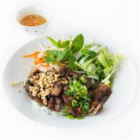 72 Grilled Pork Vermicelli · Bun Thit Nuong - Vermicelli bowls feature thin rice vermicelli noodles, served with lettuce,...