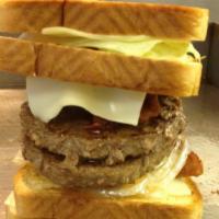 Gordito Burger · Two 5 oz. burgers served on 2 grilled cheese sandwiches.