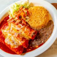 Red Enchiladas Platter · Three soft corn tortillas filled with chicken or cheese, topped with red sauce, rice and bea...