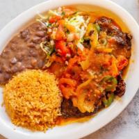 Bistec A La Mexicana Platter · Served with fresh tomato, fresh jalapeno, onions, tortillas, rice and beans.