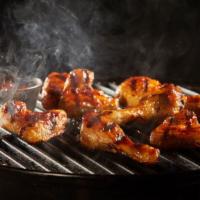 Bbq Chicken Wings · Deep fried chicken wings tossed in a tangy BBQ sauce.