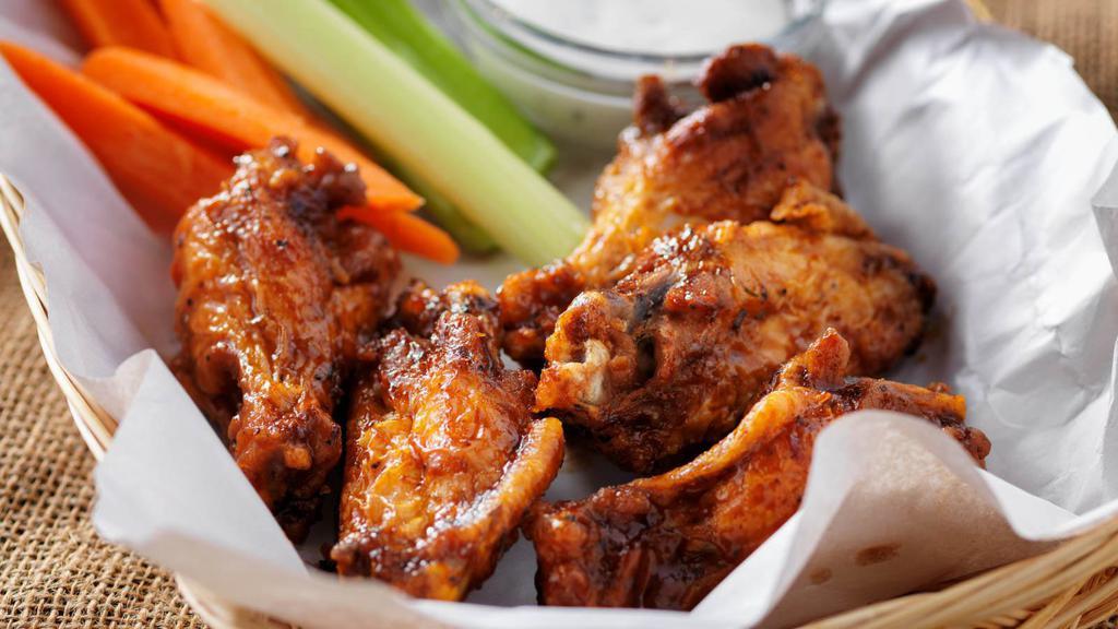Sweet Bbq Chicken Wings · Deep fried chicken wings tossed in tangy sweet BBQ sauce.