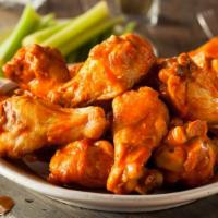 Garlic Buffalo Chicken Wings · Deep fried chicken wings tossed in a savoury and spicy sauce.