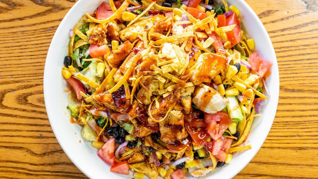 Chopped Bbq Chicken · Salad mix, black beans, sweet
corn, red onion, tomatoes, jack &
cheddar cheese, corn tortilla strips,
BBQ ranch. Served with garlic
bread.