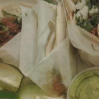 Chorizo Tacos · 3 tacos. Served with cilantro and onion. Mexican sausage.