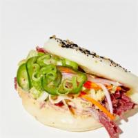 The Yenta · pastrami beef, mustard, spicy remoulade,. cabbage slaw