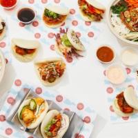 Bao Around The World* · includes all 9 bao buns, choice of 2 sides