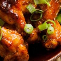 Spicy Wing · Spicy. Chicken wings deep-fried and glazed with chili sauce.
