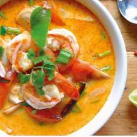 Tom Yum Noodle Soup · Spicy. Rice noodles in Thai style hot and sour coconut soup with chicken, shrimp, lemongrass...