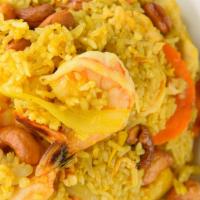 Mango Fried Rice · Fried rice with chicken, shrimp, egg, mango chunks, onions, bell peppers, curry powder, scal...