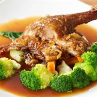 Roasted Rohan Tamarind Duck · Crispy duck with mixed vegetables in a sweet and sour tamarind sauce.
