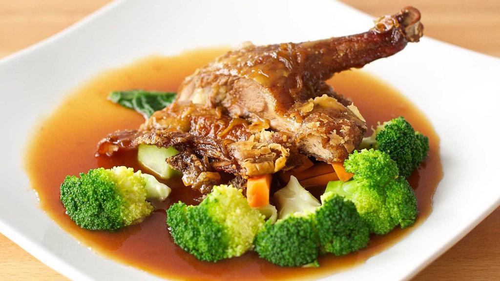 Roasted Rohan Tamarind Duck · Crispy duck with mixed vegetables in a sweet and sour tamarind sauce.