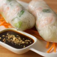 Summer Rolls · Lettuce, cucumbers, vermicelli noodles, basil, and chives wrapped in rice paper with a sweet...