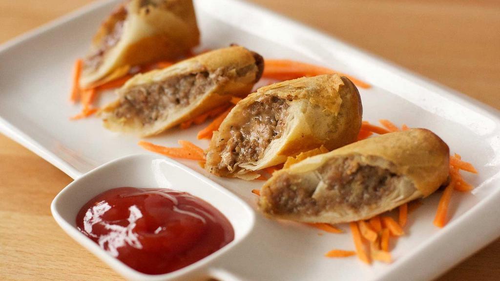 Cheese Steak Spring Roll · Popular. Rib eye steak and sautéed onions with American cheese.