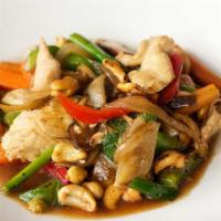 Cashew Stir Fry · With cashews, shiitake mushrooms, broccoli, carrots, peppers, onions, and scallions with a s...