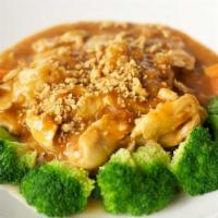 Amazing Chicken · Fresh vegetables and stir-fried chicken topped with peanut sauce.