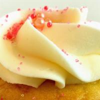 Carrie Bradshaw Cupcake · Vanilla cake with a delicious vanilla custard filling topped with vanilla buttercream swirl.