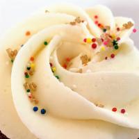 Chocolate/Vanilla Cupcake · Chocolate cupcake topped with vanilla buttercream and seasonal sprinkles.