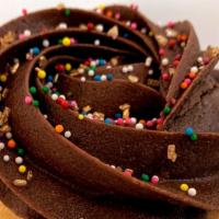 Vanilla/Chocolate Cupcake · Vanilla cupcake topped with chocolate buttercream and seasonal sprinkles.
