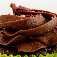 Carrie At Midnight Cupcake · Chocolate cupcake filled with chocolate custard and topped with chocolate buttercream.