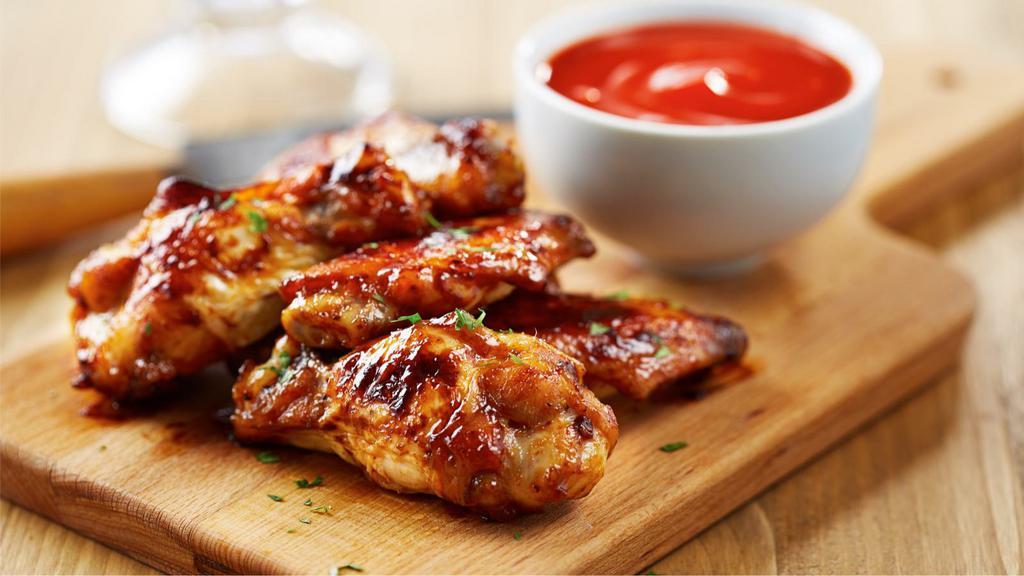 Spicy Asian Wings · Spicy hot heat spicy Asian wings.