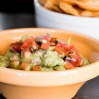 Traditional Guacamole · Avocado, tomato, red onion, cilantro and lime.