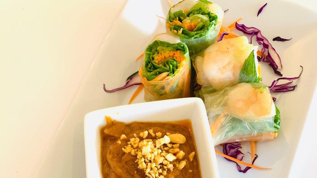 Spring Rolls · Vegetarian. Thai style spring rolls stuffed with mixed vegetables and served with sweet and sour sauce.