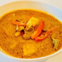 Kang Karee (Yellow Curry) · Mild spicy. Creamy Thai style yellow curry with potatoes, peas, carrots, and onions in cocon...