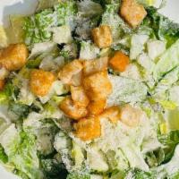 Classic Caesar Salad · Chopped Romaine, Caesar Dressing, Parmesan, Garlic-Focaccia Croutons