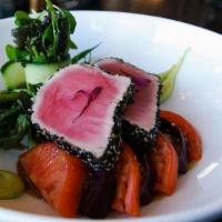 Ahi Tuna Salad · Seared Rare Sesame Tuna, Red Vine-Ripe Tomatoes, Roasted Red Beets String Beans, Cucumber, F...