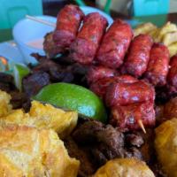 La Insuperable · A complete Dominican Picadera with Mashed Plantains (mofongo), fried meat, longaniza (Domini...