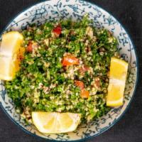 Tabouly · Parsley, tomato, onion, olive oil, cracked wheat, lettuce and lemon.